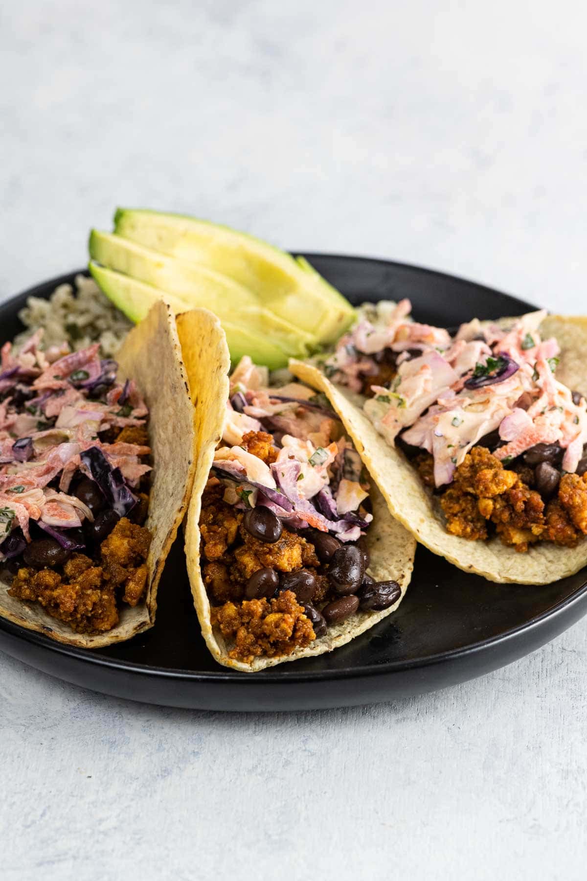 three sofritas tacos on a plate
