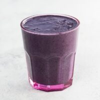 superfood smoothie with blueberries in a glass