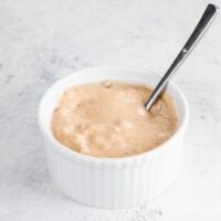 thousand island dressing in a small bowl with a spoon