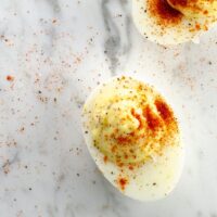 A 5 Star Deviled Egg on a marble background