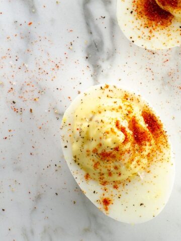 A 5 Star Deviled Egg on a marble background