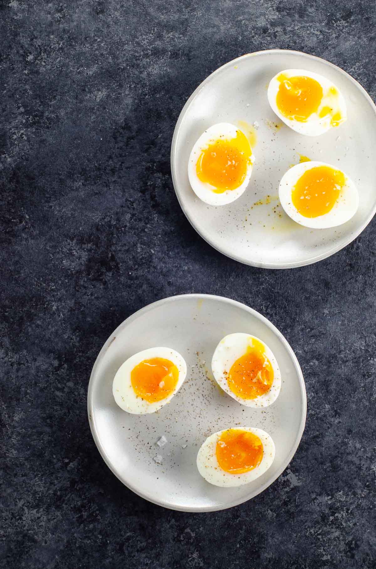 7 minute eggs (jammy eggs) on two small plates