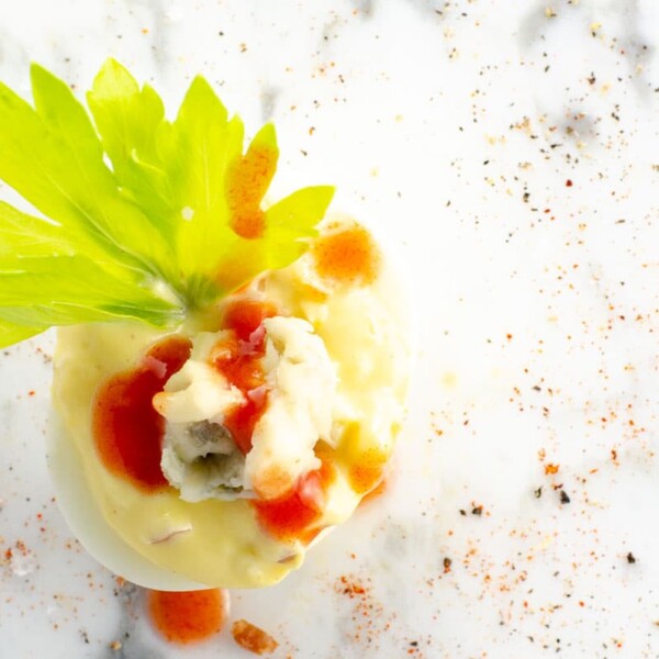 a Buffalo deviled egg on a marble background