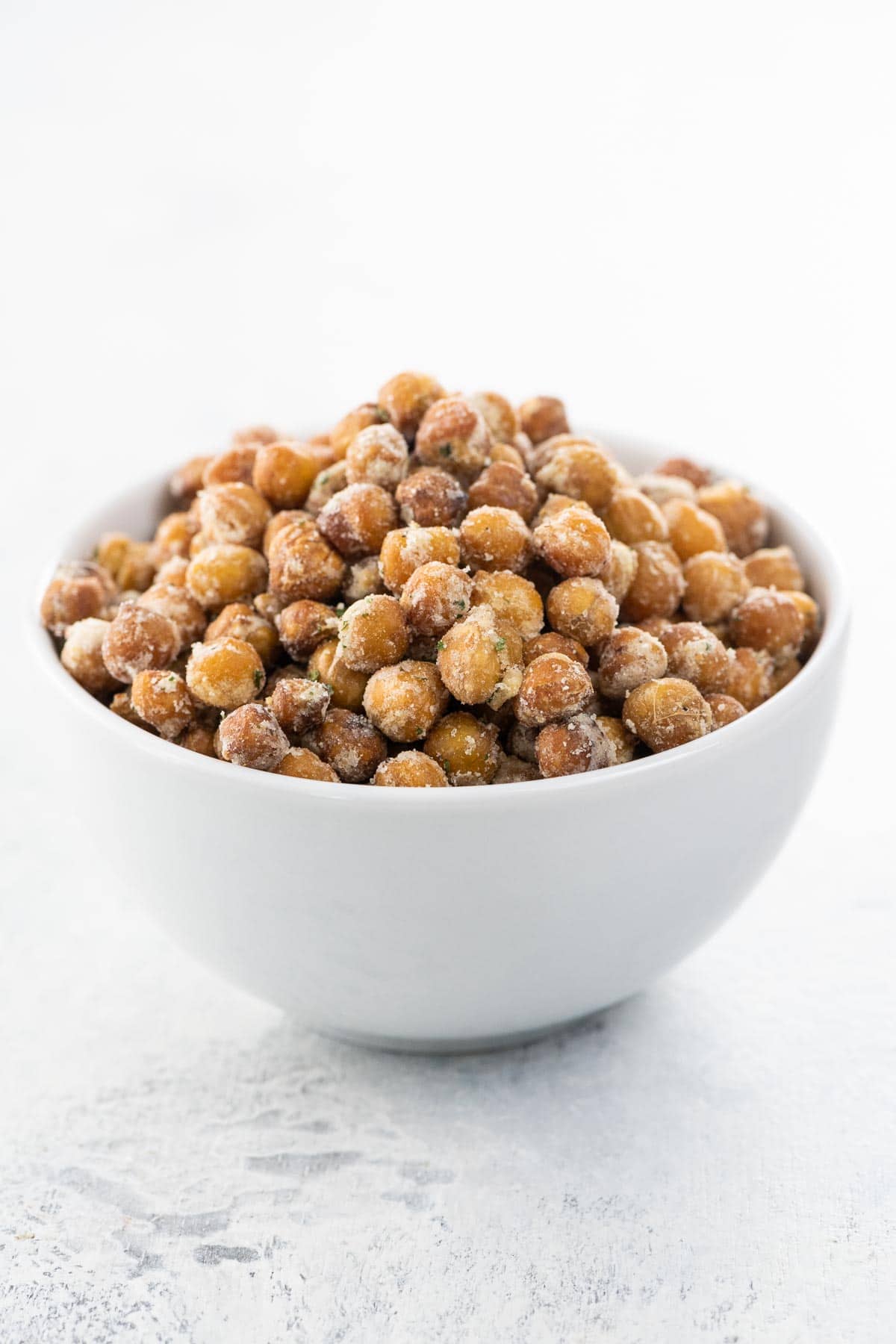 oven roasted chickpeas in a small white bowl