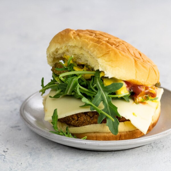 a vegan sweet potato lentil burger on a bun