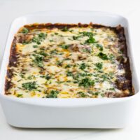 refried bean and cheese enchiladas with red tex mex enchilada sauce