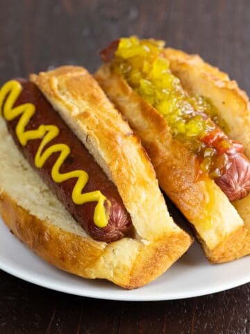 two hot dogs in new england style hot dog buns