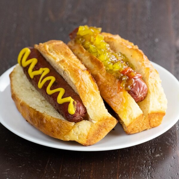 two hot dogs in new england style hot dog buns