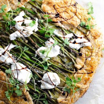 a rustic savory galette with asparagus and burrata made with savory tart dough