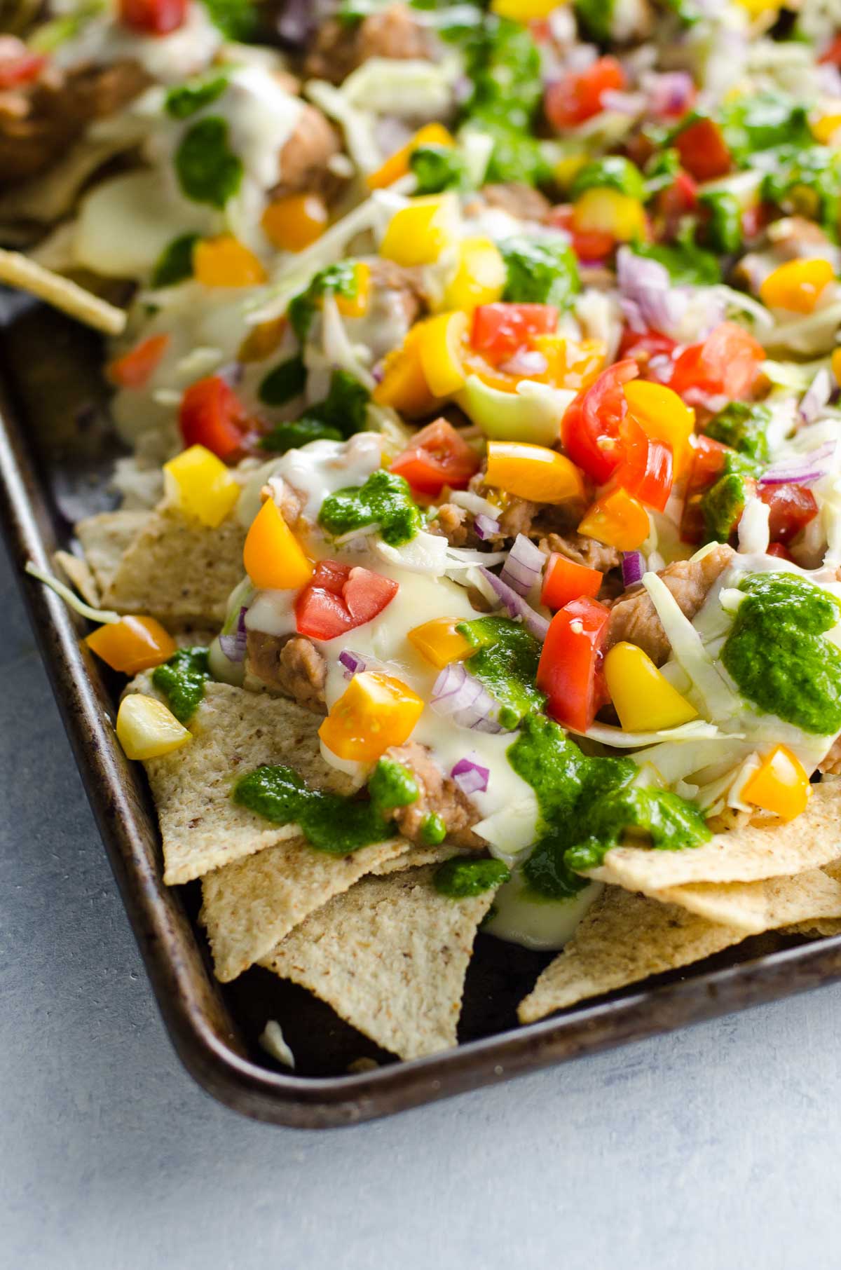 vegetarian nachos on a sheet pan