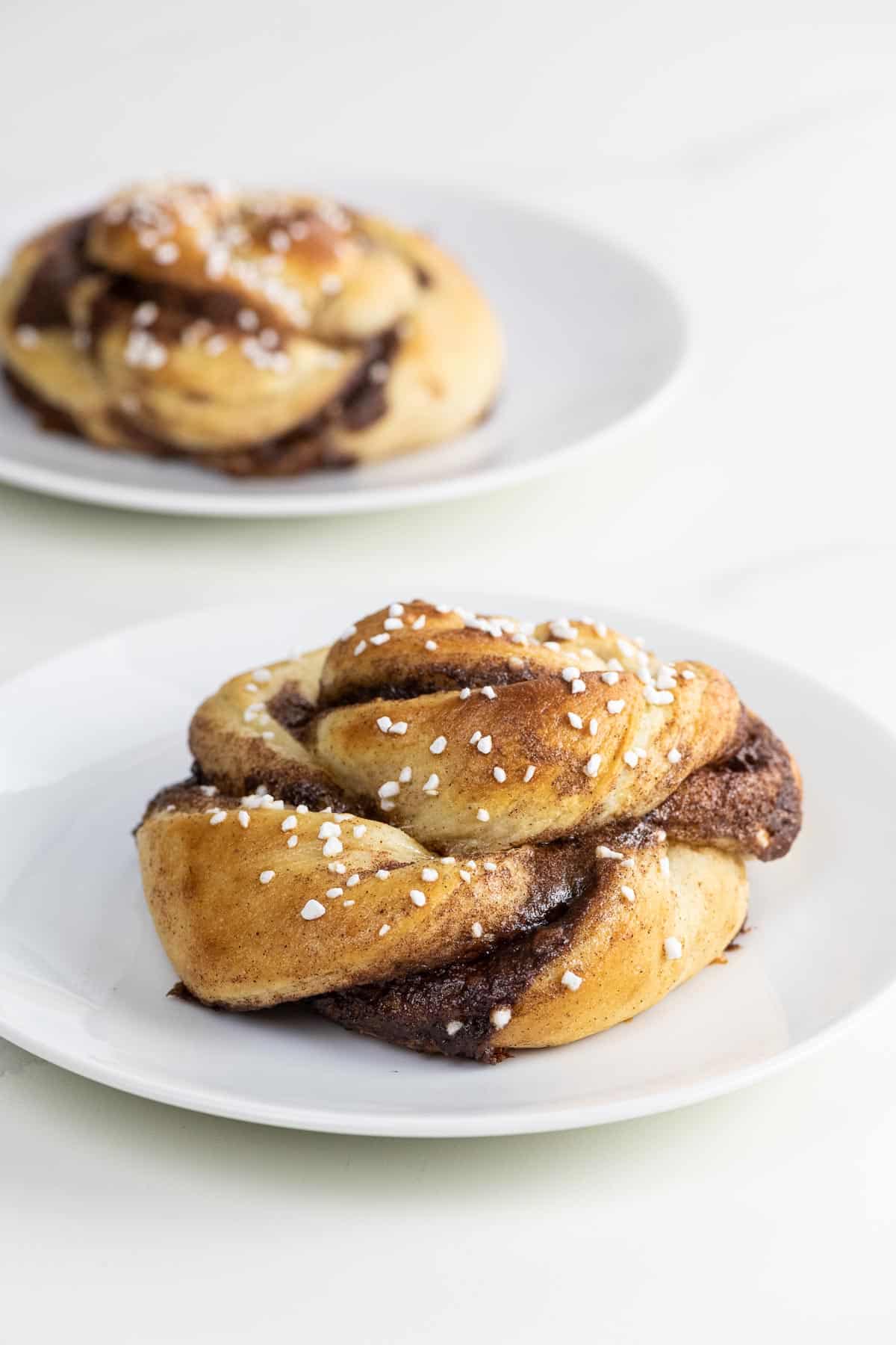 swedish cinnamon buns on small plates