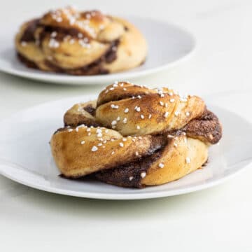 swedish cinnamon buns on small plates