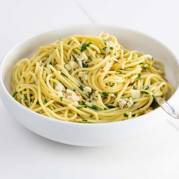 lemon garlic pasta in a bowl with a fork