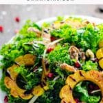 fall kale salad with delicata squash on a plate