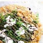 asparagus galette with jammy leeks, ricotta, and burrata in savory tart dough