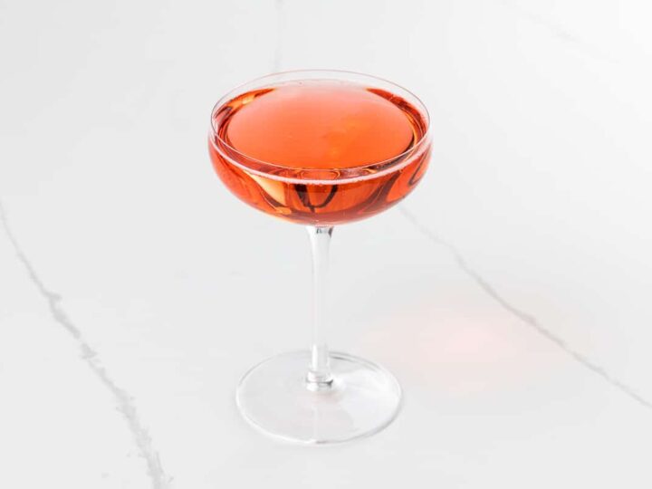 a campari prosecco cocktail (Mom's Italian soda) in a coupe glass