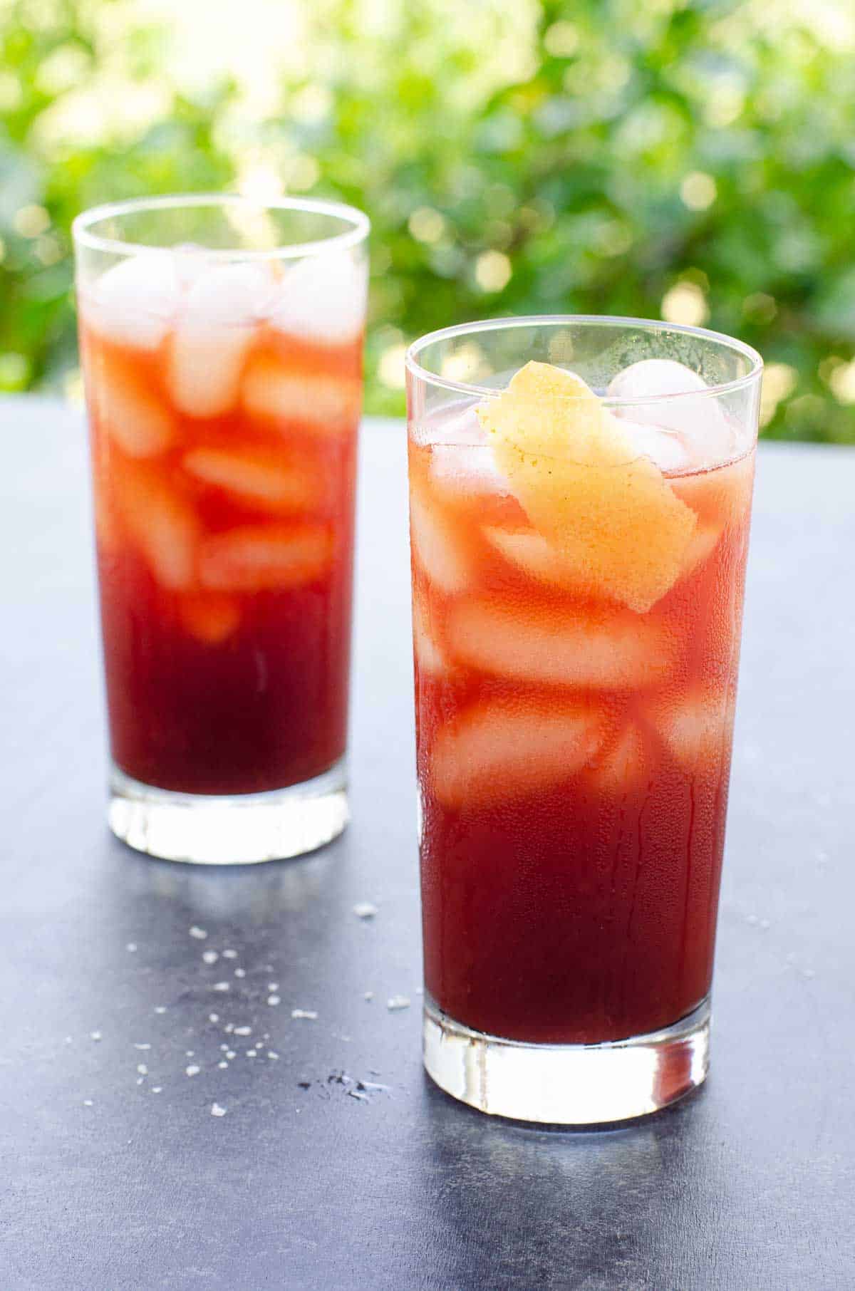 two glasses of the grand prix cold brew cocktail outdoors
