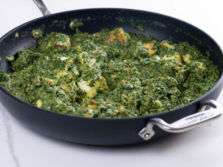 restaurant style palak paneer in a pan