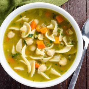 a bowl of chickpea noodle soup