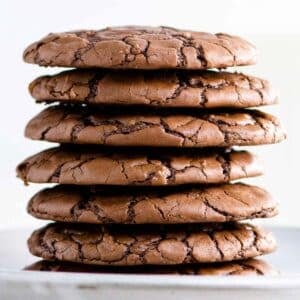 a stack of brownie cookies on a plate