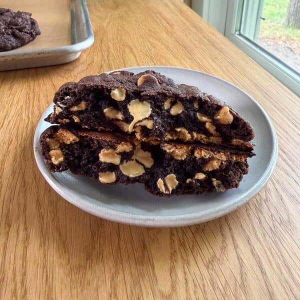 a Levain Bakery dark chocolate peanut butter chip cookie on a plate