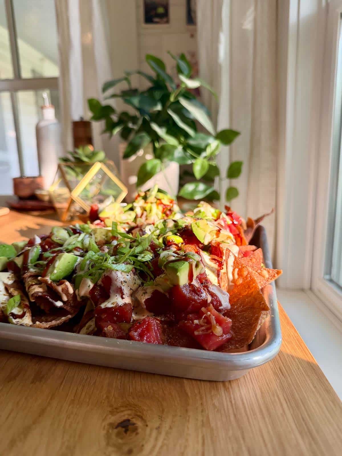 spicy tuna poke nachos on a quarter sheet pan